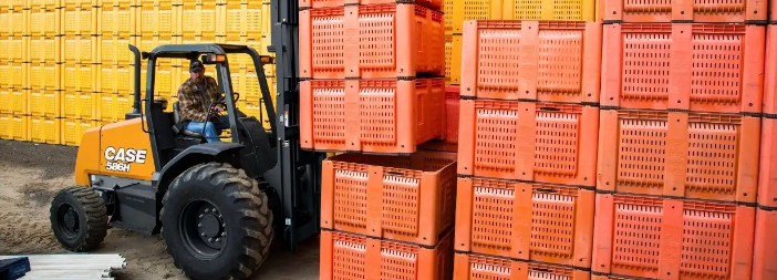 CASE forklift moving crates